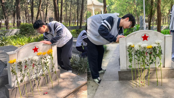 图3，郑州市第十四高级中学学生为烈士打扫墓碑.jpg